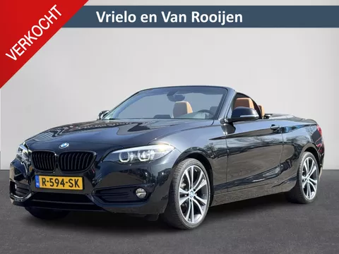 BMW 2-serie Cabrio 220i High Executive | Automaat | Airco | Cruise | Lederenstuurwiel | LM velgen | Navi | Voorstoelen verwarmd | ( Vestiging - Nieuwegein )