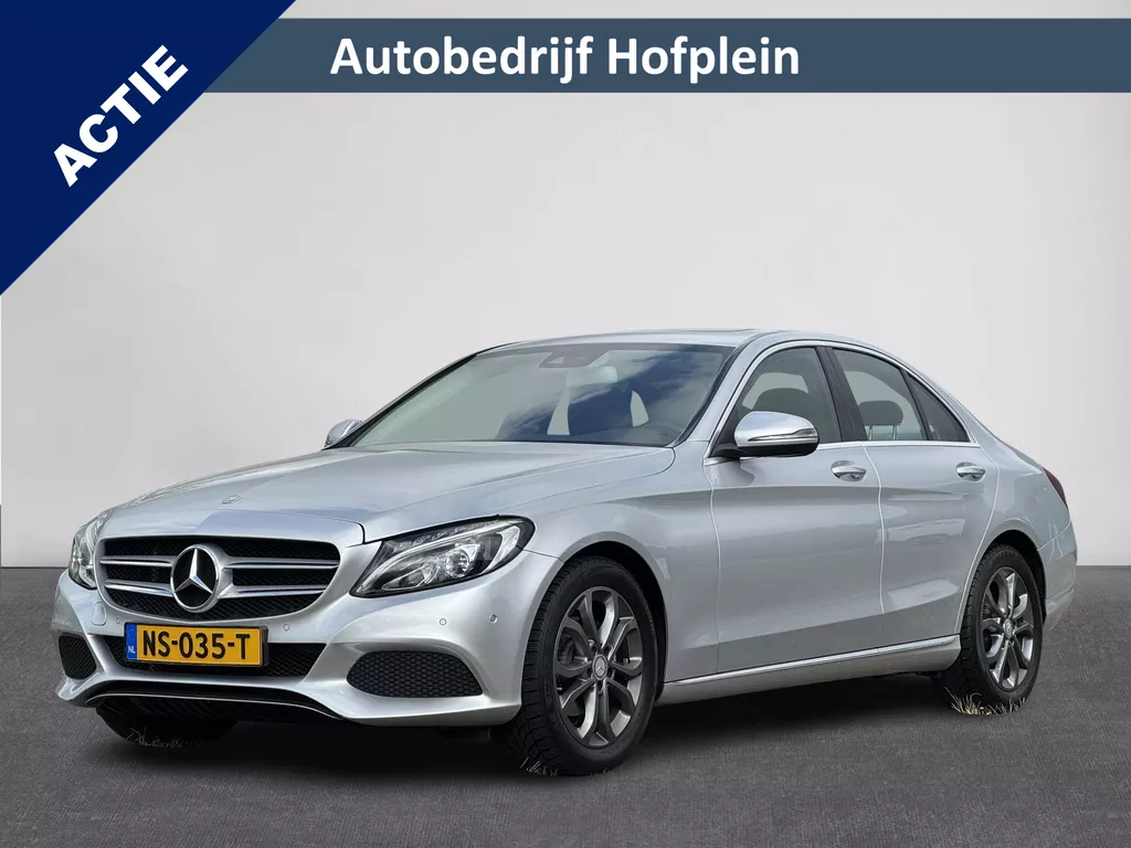 Mercedes-Benz C-klasse C180 Prestige Automaat | &euro; 1.000 INRUILPREMIE | Navigatie | LED Verlichting | Dode Hoek Detectie | Panorama schuif/Kanteldak, Elektrisch | Stoelverwarming | PDC | Automatische Airco | 17&quot;Lmv | Halfleer | Sportstoelen | INCLUSIEF EXTRA ORIGINELE SET LICHTMETALEN VELGEN (vestiging Vianen)